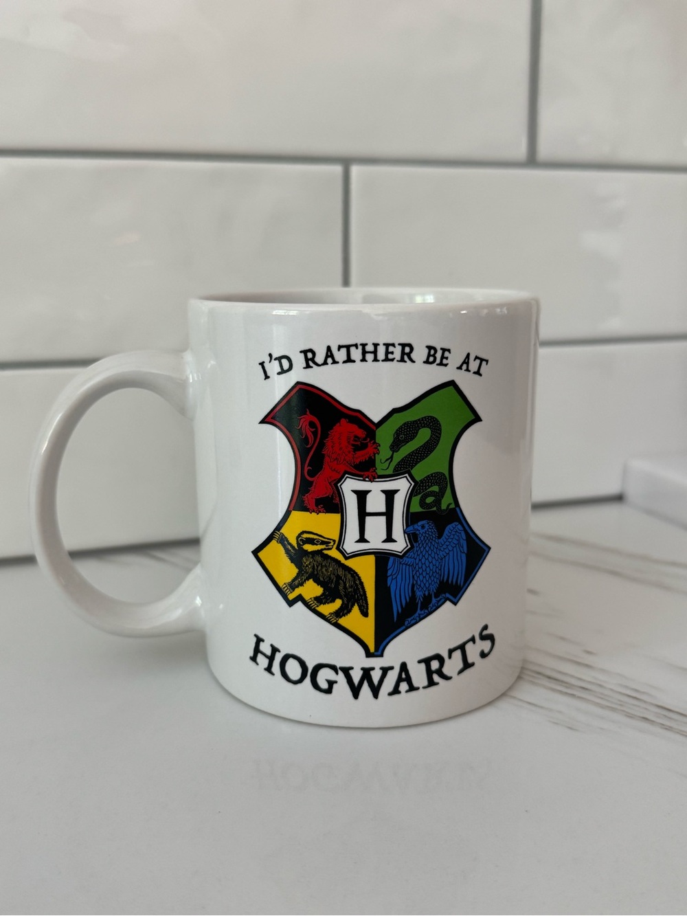 Warner Bros. White Hogwarts Crest Mug with Red Green Yellow Blue Panels